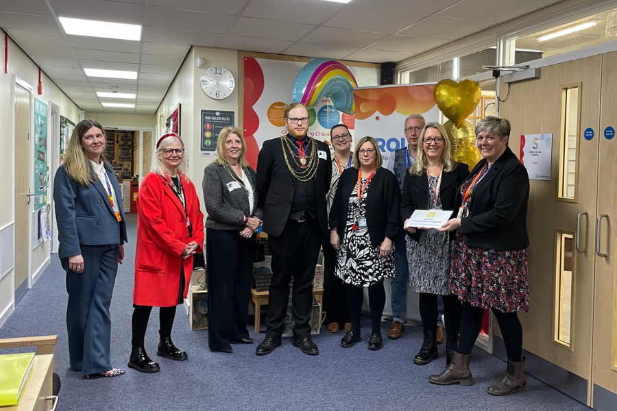 The team at Sheep Dip Lane Academy receiving their Thrive School of Excellence award